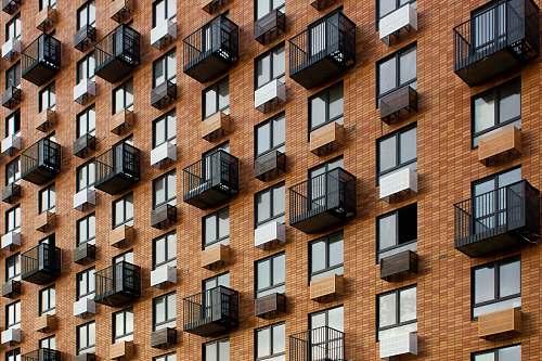 high rise brown and black building urban